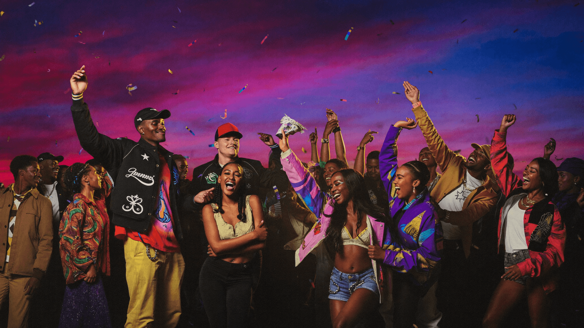 Young Africans from across the continent celebrating together under a magenta and violet dusk