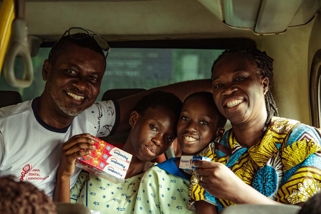 Israel Laryea with commuters and Pepsodent Consumers on the Pepsodent Smile Ride on WOHD, 2025